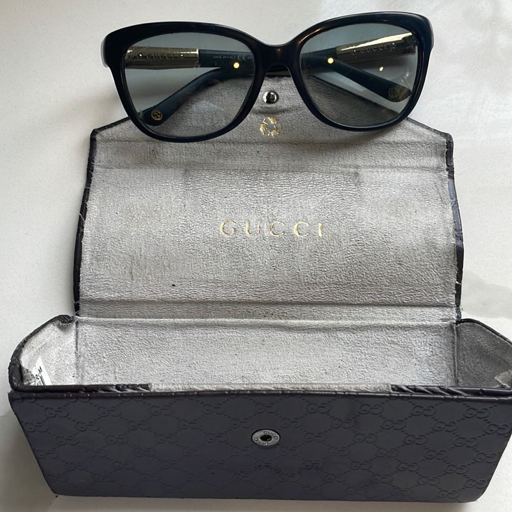 Gucci sunglasses.  Bamboo sides.